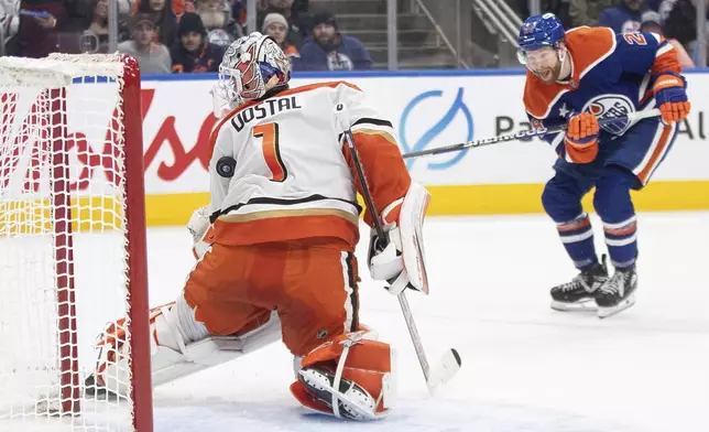 Anaheim Ducks' goalie Lukas Dostal (1) makes the save on Edmonton Oilers' Connor Brown (28) during the second period of an NHL hockey game, Friday, Jan. 3, 2025 in Edmonton, Alberta. (Jason Franson/The Canadian Press via AP)