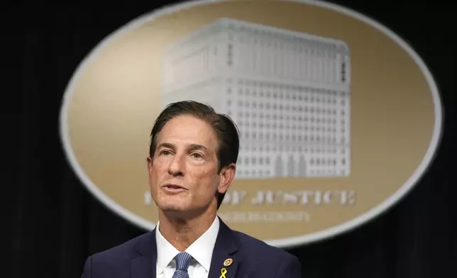 Los Angeles County District Attorney Nathan Hochman talks about the resentencing of Erik and Lyle Menendez for the murders of their parents decades ago during a news conference in downtown Los Angeles on Friday, Jan. 3, 2025. (AP Photo/Damian Dovarganes)