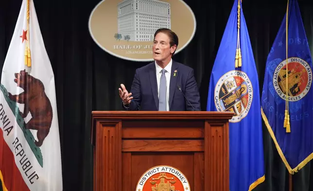 Los Angeles County District Attorney Nathan Hochman talks about the resentencing of Erik and Lyle Menendez for the murders of their parents decades ago during a news conference in downtown Los Angeles on Friday, Jan. 3, 2025. (AP Photo/Damian Dovarganes)