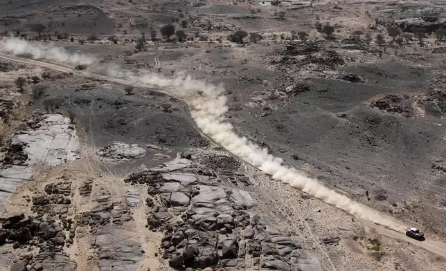 Driver Mathieu Serradori and co-driver Loic Minaudier compete during stage one of the Dakar Rally with start and finish in Bisha, Saudi Arabia, Saturday, Jan. 4, 2025. (AP Photo/Christophe Ena)