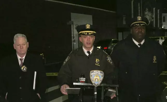 In this grab taken from a video provided by the New York Police Department, Chief of Patrol Philip Rivera, centre, speaks to the media during a press conference in New York, early Thursday, Jan. 2, 2025, the day after a shooting outside a nightclub in Queens. (NYPD via AP)