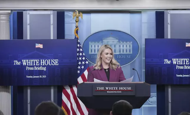 White House press secretary Karoline Leavitt arrives to speak with reporters in the James Brady Press Briefing Room at the White House, Tuesday, Jan. 28, 2025, in Washington. (AP Photo/Alex Brandon)