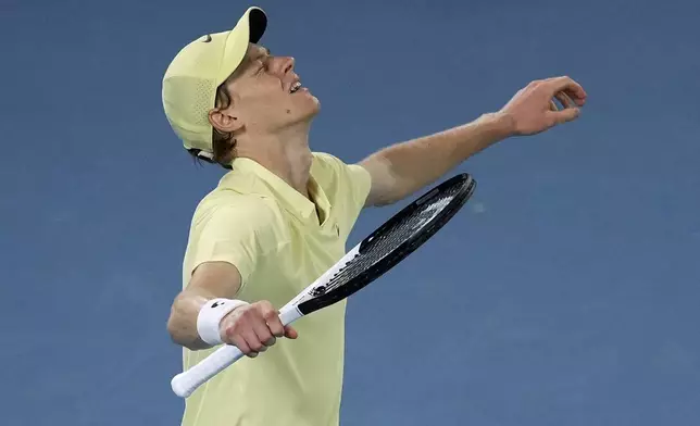 Jannik Sinner of Italy celebrates after defeating Alexander Zverev of Germany in the men's singles final at the Australian Open tennis championship in Melbourne, Australia, Sunday, Jan. 26, 2025.(AP Photo/Mark Baker)