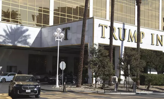 A car drives out of Trump International Hotel in Las Vegas Thursday, Jan. 2, 2025, in Las Vegas. (AP Photo/Ian Maule)