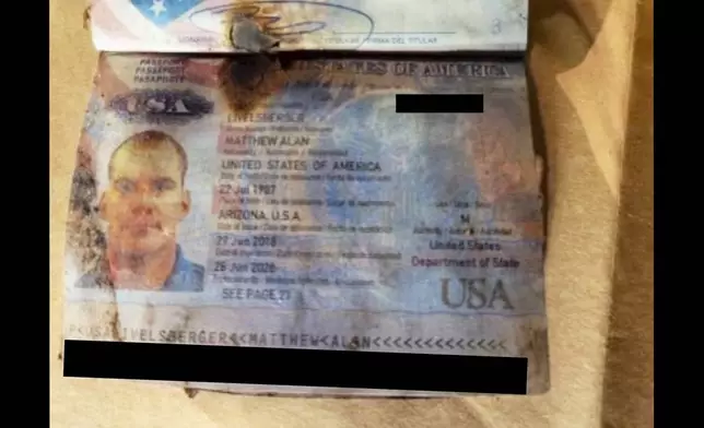 This undated photo, provided by the Las Vegas Police Department shows a passport belonging to Matthew Livelsberger, found inside a Tesla Cybertruck involved in an explosion outside the Trump Hotel in Las Vegas. (Las Vegas Police Department via AP)