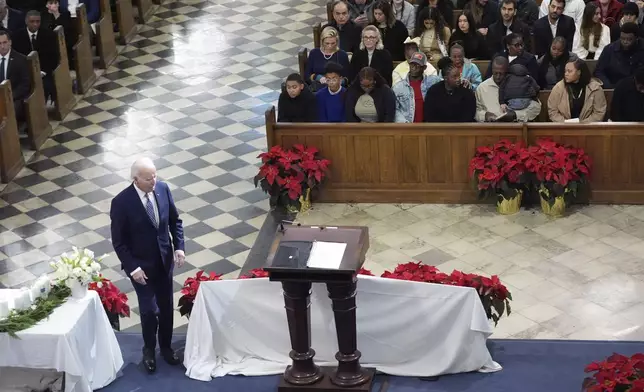 President Joe Biden walks to the podium to speak during an interfaith prayer service for the victims of the deadly New Years truck attack, at St. Louis Cathedral in New Orleans, Monday, Jan. 6, 2025. (AP Photo/Stephanie Scarbrough)