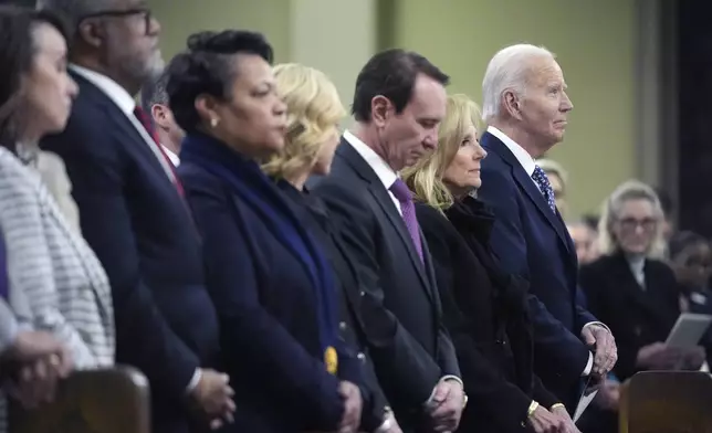 President Joe Biden and first lady Jill Biden participate in an interfaith prayer service for the victims of the deadly New Years truck attack, at St. Louis Cathedral in New Orleans, Monday, Jan. 6, 2025. (AP Photo/Stephanie Scarbrough)