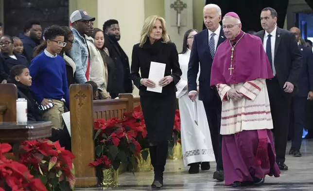 President Joe Biden and first lady Jill Biden arrive to participate in an interfaith prayer service for the victims of the deadly New Years truck attack, at St. Louis Cathedral in New Orleans, Monday, Jan. 6, 2025. (AP Photo/Stephanie Scarbrough)