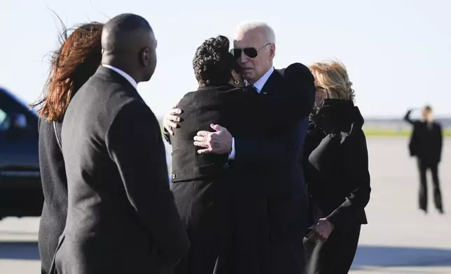 President Joe Biden is greeted by New Orleans Mayor LaToya Cantrell, Rep. Cleo Fields and Rep. Troy Carter and wife Andree Carter, as he arrives Air Force One at Louis Armstrong New Orleans International Airport in New Orleans, Monday, Jan. 6, 2025. (AP Photo/Stephanie Scarbrough)