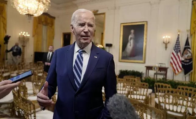 President Joe Biden speaks with reporters after signing the Social Security Fairness Act in the East Room of the White House, Sunday, Jan. 5, 2025, in Washington. (AP Photo/Manuel Balce Ceneta)