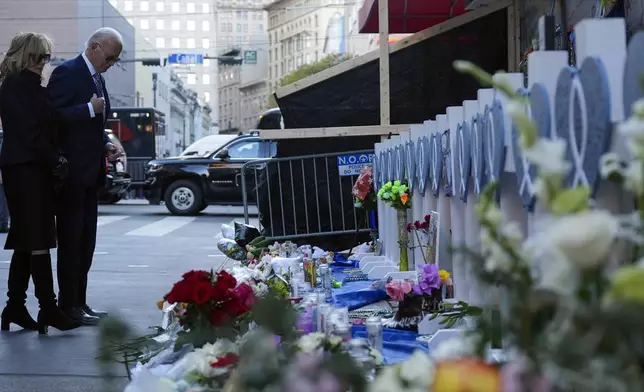 President Joe Biden and first lady Jill Biden stop at the site of the deadly New Years truck attack, in New Orleans, Monday, Jan. 6, 2025. (AP Photo/Stephanie Scarbrough)