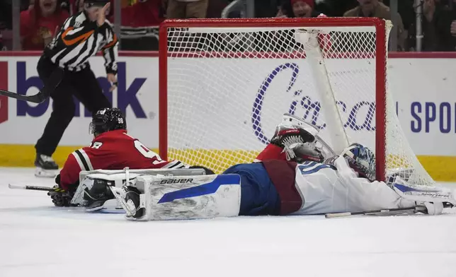 Chicago Blackhawks center Connor Bedard (98) gets the puck past Colorado Avalanche goaltender Trent Miner (50) but it is declared no goal during the second period of an NHL hockey game Wednesday, Jan. 8, 2025, in Chicago. (AP Photo/Erin Hooley)