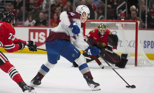 Colorado Avalanche center Juuso Parssinen (16) scores on Chicago Blackhawks goaltender Petr Mrazek (34) during the first period of an NHL hockey game Wednesday, Jan. 8, 2025, in Chicago. (AP Photo/Erin Hooley)