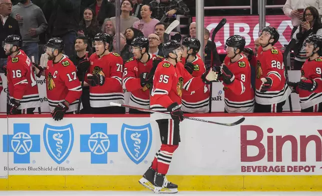 Chicago Blackhawks right wing Ilya Mikheyev (95) celebrates his goal on the Colorado Avalanche during the first period of an NHL hockey game Wednesday, Jan. 8, 2025, in Chicago. (AP Photo/Erin Hooley)