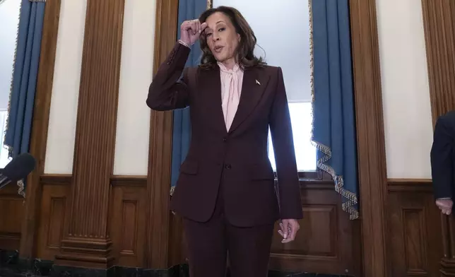 Vice President Kamala Harris talks to reporters after presiding over a joint session of Congress to confirm the Electoral College votes at the Capitol, Monday, Jan. 6, 2025, in Washington. (AP Photo/Jose Luis Magana)