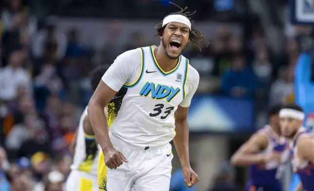 Indiana Pacers center Myles Turner (33) reacts during the first half of an NBA basketball game against the Phoenix Suns in Indianapolis, Saturday, Jan. 4, 2025. (AP Photo/Doug McSchooler)