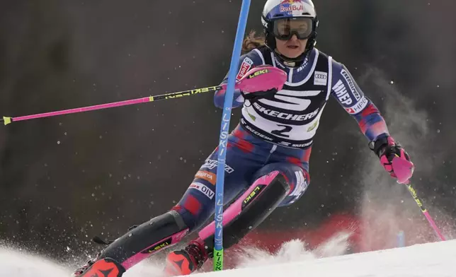 Croatia's Zrinka Ljutic speeds down the course during an alpine ski, women's World Cup slalom race, in Kranjska Gora, Slovenia, Sunday, Jan. 5, 2025. (AP Photo/Piermarco Tacca)