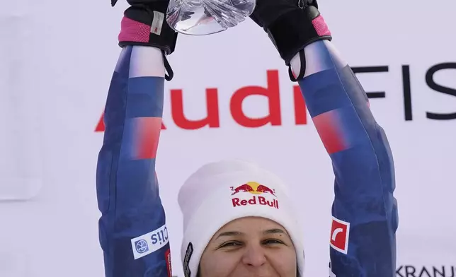 The winner Croatia's Zrinka Ljutic celebrates after an alpine ski, women's World Cup slalom race, in Kranjska Gora, Slovenia, Sunday, Jan. 5, 2025. (AP Photo/Piermarco Tacca)