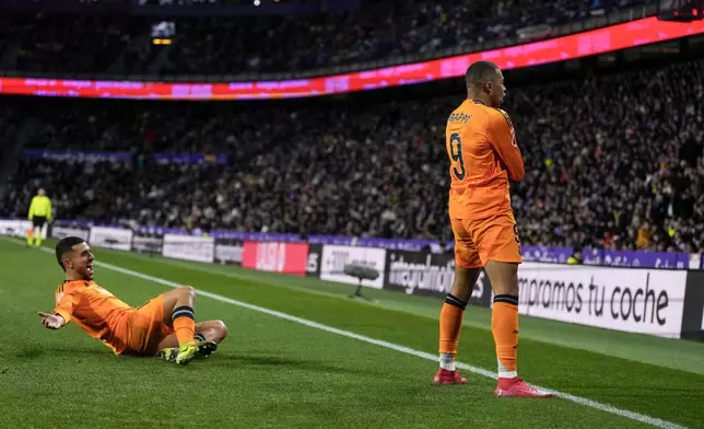 Real Madrid's Kylian Mbappe celebrates after scoring his side's second goal during the Spanish La Liga soccer match between Valladolid and Real Madrid at the Jose Zorrilla stadium in Valladolid, Spain, Saturday, Jan. 25, 2025. (AP Photo/Manu Fernandez)