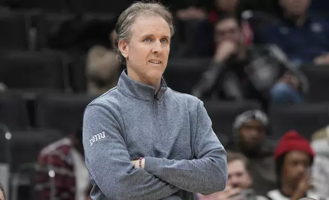 Washington Wizards head coach Brian Keefe looks on during the first half of an NBA basketball game against the Houston Rockets, Tuesday, Jan. 7, 2025, in Washington. (AP Photo/Jess Rapfogel)