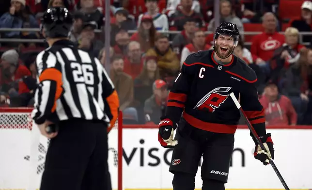 Carolina Hurricanes' Jordan Staal (11) protests a call with an official during the second period of an NHL hockey game against the Minnesota Wild in Raleigh, N.C., Saturday, Jan. 4, 2025. (AP Photo/Karl DeBlaker)