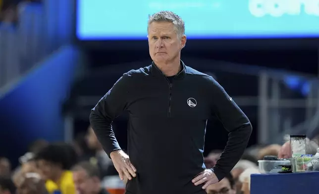 Golden State Warriors head coach Steve Kerr watches during the first half of an NBA basketball game against the Memphis Grizzlies, Saturday, Jan. 4, 2025, in San Francisco. (AP Photo/Godofredo A. Vásquez)