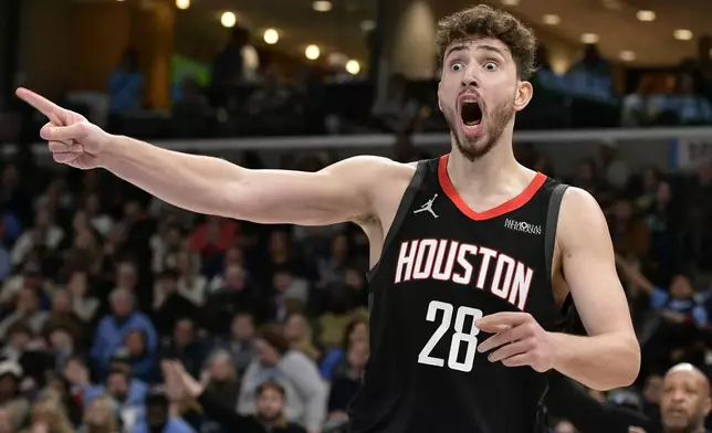 Houston Rockets center Alperen Sengun reacts in the first half of an NBA basketball game against the Memphis Grizzlies, Thursday, Jan. 9, 2025, in Memphis, Tenn. (AP Photo/Brandon Dill)