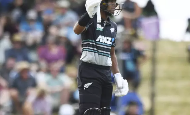 New Zealand player Rachin Ravindra scores fifty runs during the 3rd T20 match between New Zealand and Sri Lanka at Saxton Oval in Nelson, New Zealand, Thursday, Jan. 2, 2025. (Chris Symes/Photosport via AP)