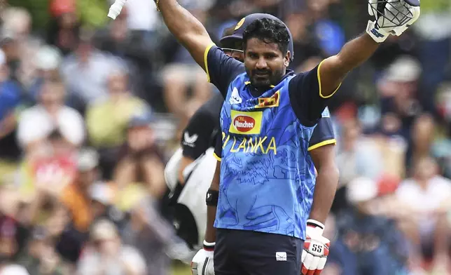 Sri Lanka player Kusal Perera celebrates his century during the 3rd T20 match between New Zealand and Sri Lanka at Saxton Oval in Nelson, New Zealand, Thursday, Jan. 2, 2025. (Chris Symes/Photosport via AP)