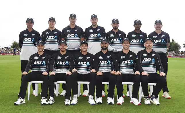 New Zealand's team members pose for a photo during the 3rd T20 match between New Zealand and Sri Lanka at Saxton Oval in Nelson, New Zealand, Thursday, Jan. 2, 2025. (Chris Symes/Photosport via AP)