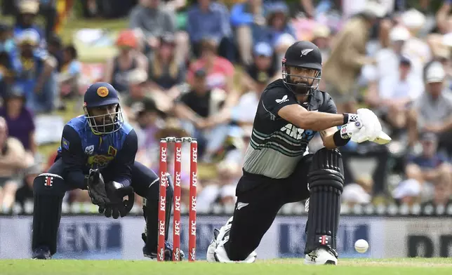 New Zealand's Daryl Mitchell plays during the 3rd T20 match between New Zealand and Sri Lanka at Saxton Oval in Nelson, New Zealand, Thursday, Jan. 2, 2025. (Chris Symes/Photosport via AP)