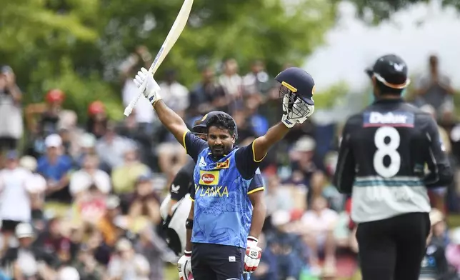 Sri Lanka player Kusal Perera celebrates his century during the 3rd T20 match between New Zealand and Sri Lanka at Saxton Oval in Nelson, New Zealand, Thursday, Jan. 2, 2025. (Chris Symes/Photosport via AP)