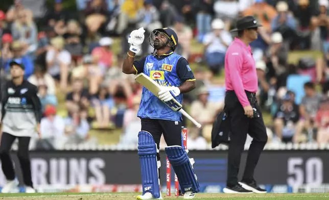 Sri Lanka player Kusal Perera celebrates fifty runs during the 3rd T20 match between New Zealand and Sri Lanka at Saxton Oval in Nelson, New Zealand, Thursday, Jan. 2, 2025. (Chris Symes/Photosport via AP)