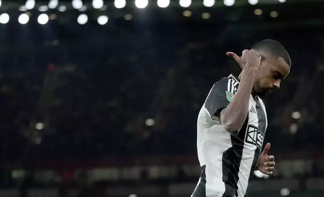 Newcastle's Alexander Isak celebrates after scoring the opening goal during the English League Cup semifinal first leg soccer match between Arsenal and Newcastle United at the Emirates stadium in London, Tuesday, Jan. 7, 2025. (AP Photo/Kirsty Wigglesworth)