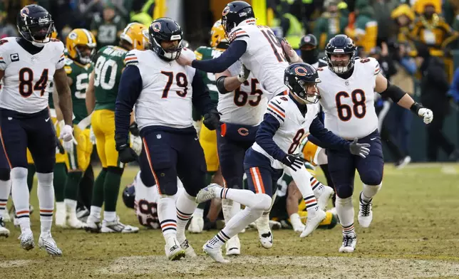 Chicago Bears' Cairo Santos reacts after making the game-winning field goal during the second half of an NFL football game against the Green Bay Packers Sunday, Jan. 5, 2025, in Green Bay, Wis. (AP Photo/Mike Roemer)