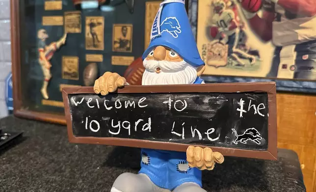 An NFL football Detroit Lions gnome is displayed in fan Rob Gonzales' basement Thursday, Jan. 16, 2025, in Frenchtown Township, Mich. (AP Photo/Mike Householder)