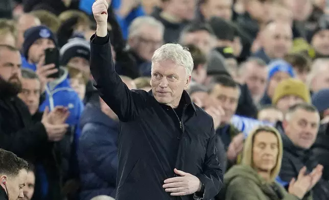 Everton's manager David Moyes gestures to the fans ahead of the English Premier League soccer match between Everton and Aston Villa at Goodison Park, Liverpool, England, Wednesday, Jan. 15, 2025. (Peter Byrne/PA via AP)