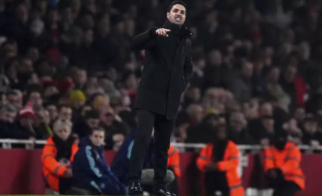 Arsenal's manager Mikel Arteta reacts during the English Premier League soccer match between Arsenal and Tottenham Hotspur at the Emirates Stadium, London, Wednesday, Jan. 15, 2025. (Bradley Collyer/PA via AP)