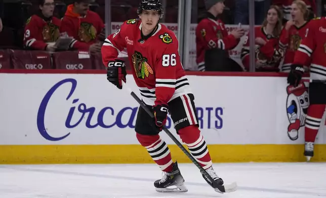Chicago Blackhawks center Teuvo Teravainen warms up before an NHL hockey game against the Carolina Hurricanes in Chicago, Monday, Jan. 20, 2025. (AP Photo/Nam Y. Huh)