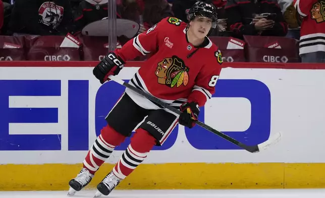Chicago Blackhawks center Teuvo Teravainen warms up before an NHL hockey game against the Carolina Hurricanes in Chicago, Monday, Jan. 20, 2025. (AP Photo/Nam Y. Huh)