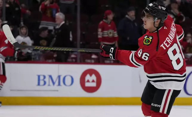 Chicago Blackhawks center Teuvo Teravainen warms up before an NHL hockey game against the Carolina Hurricanes in Chicago, Monday, Jan. 20, 2025. (AP Photo/Nam Y. Huh)