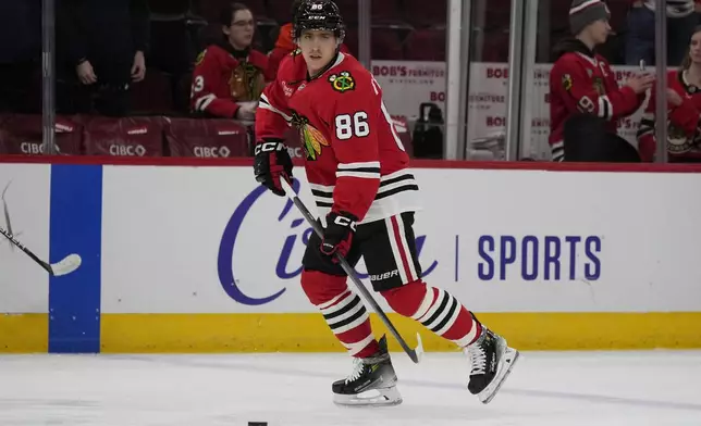 Chicago Blackhawks center Teuvo Teravainen warms up before an NHL hockey game against the Carolina Hurricanes in Chicago, Monday, Jan. 20, 2025. (AP Photo/Nam Y. Huh)