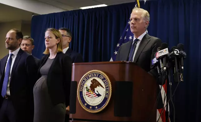 First Assistant United States Attorney Patrick D. Robbins, right, stands with federal officials as he speaks at a news conference announcing the indictment of former Oakland Mayor Sheng Thao on Friday, Jan. 17, 2025 in San Francisco, Calif. (Lea Suzuki/San Francisco Chronicle via AP)