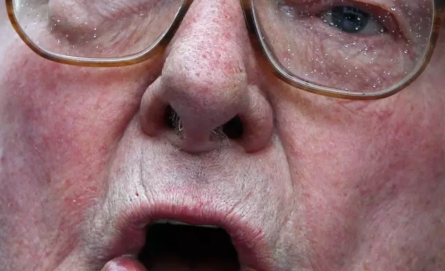 FILE - French far-right politician Jean Marie Le Pen, father of Marine Le Pen, the National Front party candidate for the 2012 French presidential elections delivers a speech in front of a statue of Joan of Arc, to mark the 600th anniversary of her birth, in Paris, Saturday, Jan. 7, 2012. (AP Photo/Francois Mori, File)