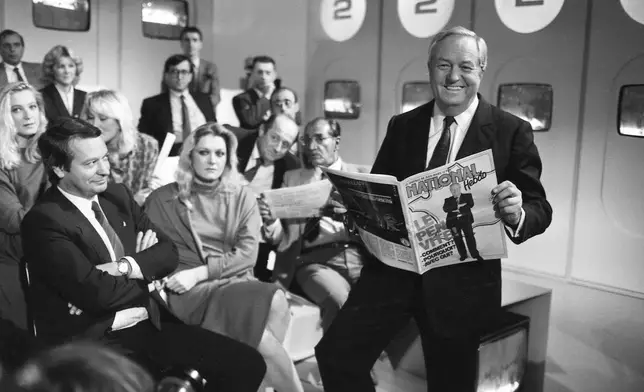 FILE - Jean Marie Le Pen and his daughters Marine Le Pen, Yann Le Pen and Marie-Caroline Le Pen, in the studio for the filming of L'Heure de Vérité on Oct. 16, 1985 in Paris, France. (AP Photo/Herve Merliac, File)