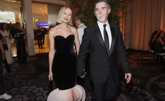 Naomi Watts, left, and Billy Crudup arrive at the 82nd Golden Globes on Sunday, Jan. 5, 2025, at the Beverly Hilton in Beverly Hills, Calif. (AP Photo/Chris Pizzello)