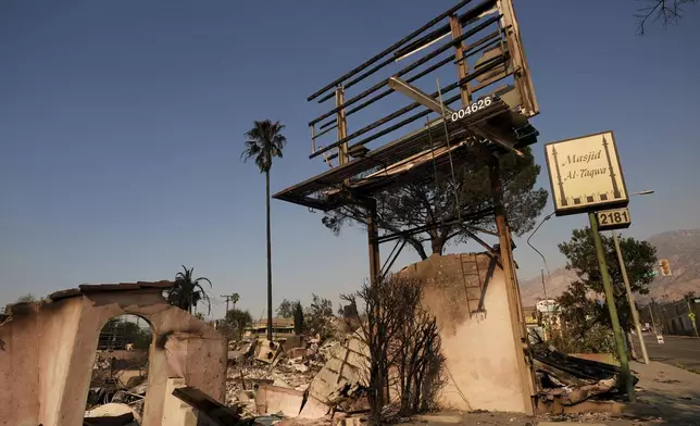 The remains of the Masjid-Al-Taqwa mosque are seen in the aftermath of the Eaton Fire Friday, Jan. 10, 2025 in Altadena, Calif. (AP Photo/Jae C. Hong)