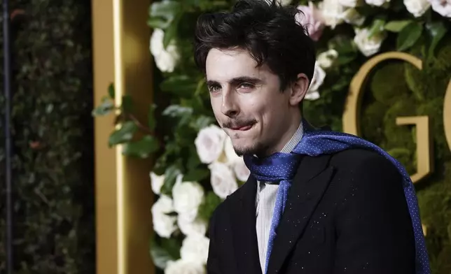 Timothee Chalamet arrives at the 82nd Golden Globes on Sunday, Jan. 5, 2025, at the Beverly Hilton in Beverly Hills, Calif. (Photo by Jordan Strauss/Invision/AP)