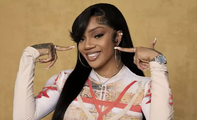 FILE - GloRilla poses for a portrait in Los Angeles, Oct. 10, 2024. (Photo by Rebecca Cabage/Invision/AP File)