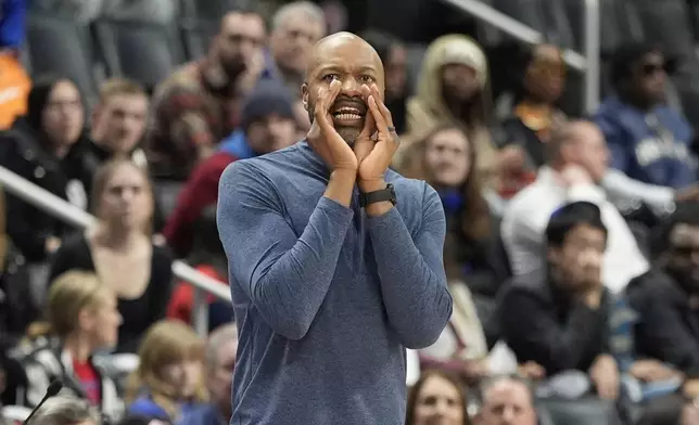 Orlando Magic head coach Jamahl Mosley yells during the first half of an NBA basketball game against the Detroit Pistons, Wednesday, Jan. 1, 2025, in Detroit. (AP Photo/Carlos Osorio)